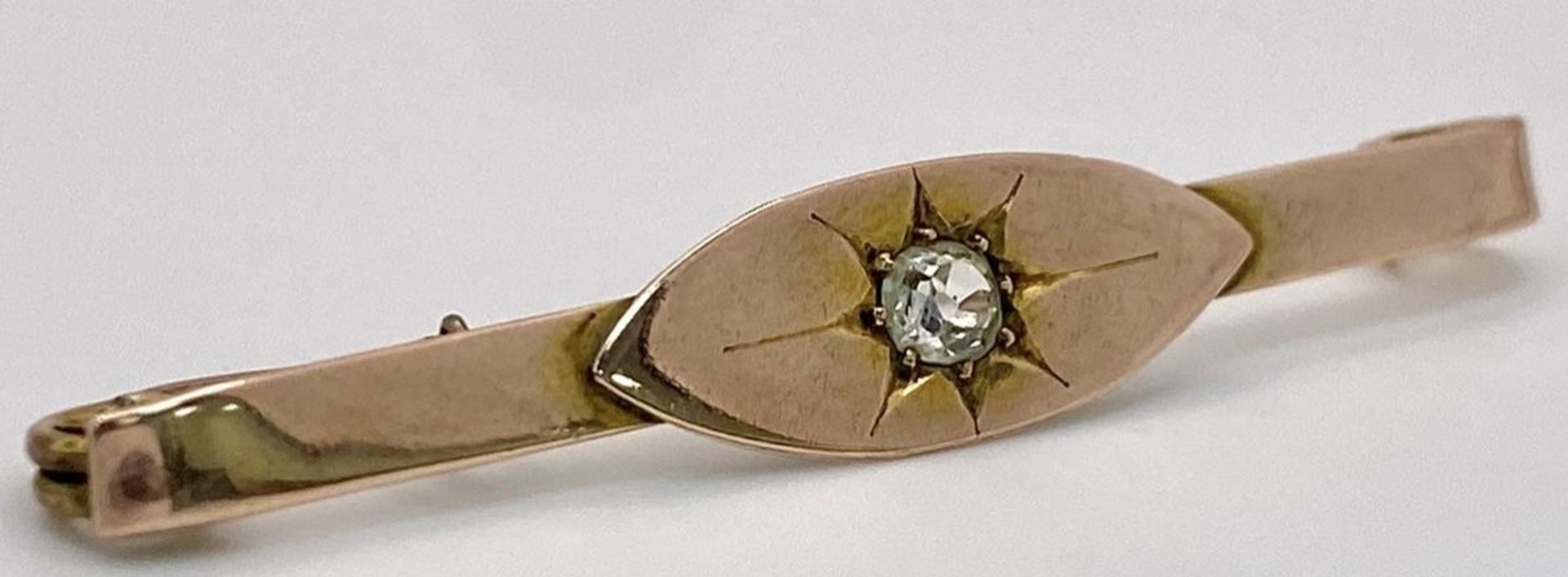 An Antique 9K Rose Gold (tested) Diamond Bar Brooch. A Gypsy set quality old cut diamond. 5.5cm. 4. - Image 4 of 5