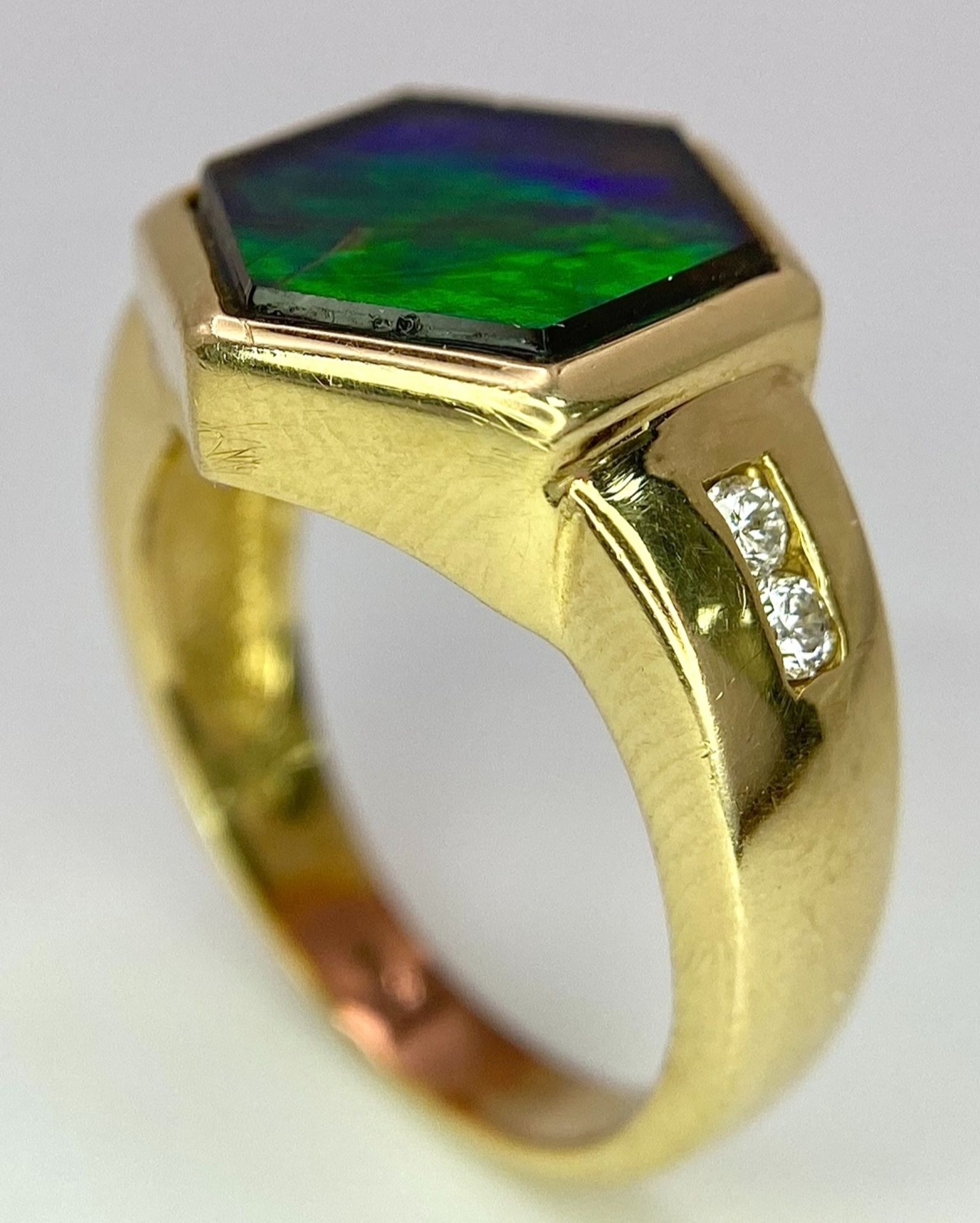 A Very Different, 14K Gold, Ammolite and Diamond Ring. Hexagonal shape. Size L. 6.3g total weight. - Image 7 of 9