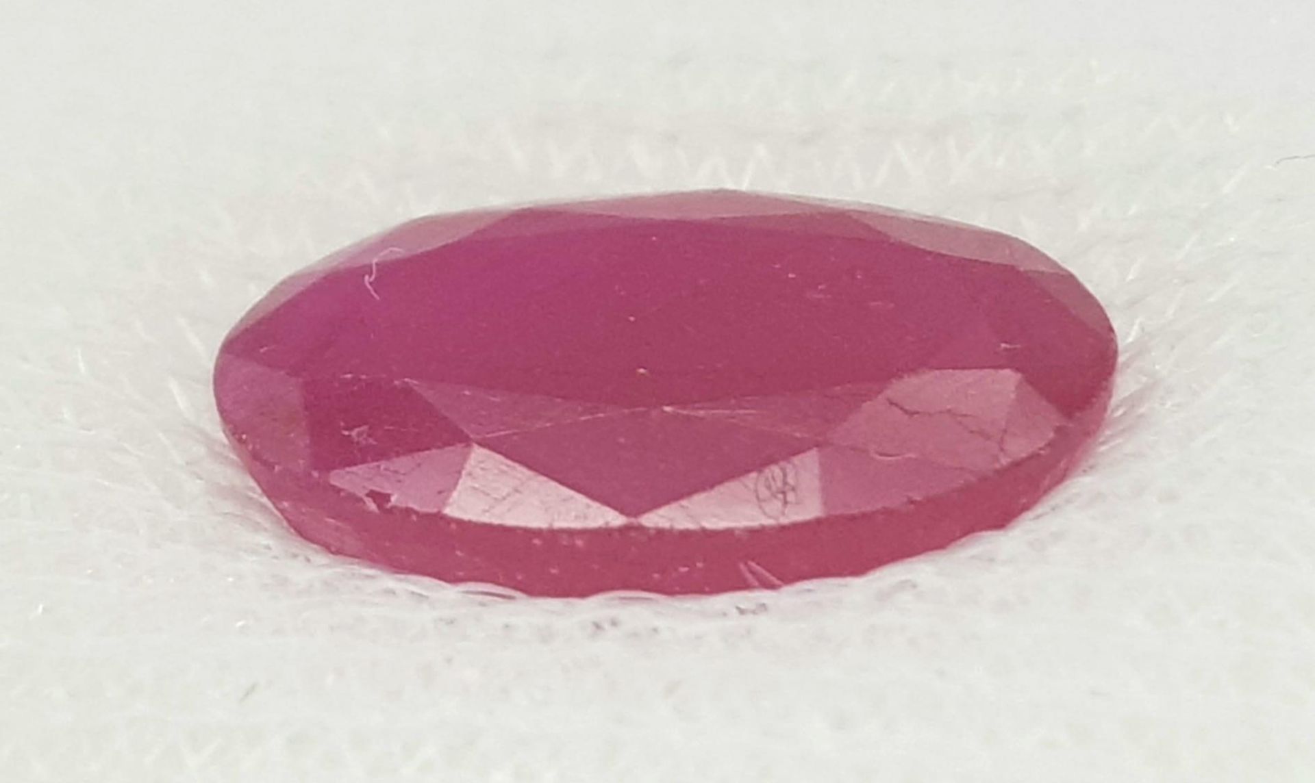 A 5.03ct Rare Burmese Ruby Gemstone - AIG certified in a sealed container.