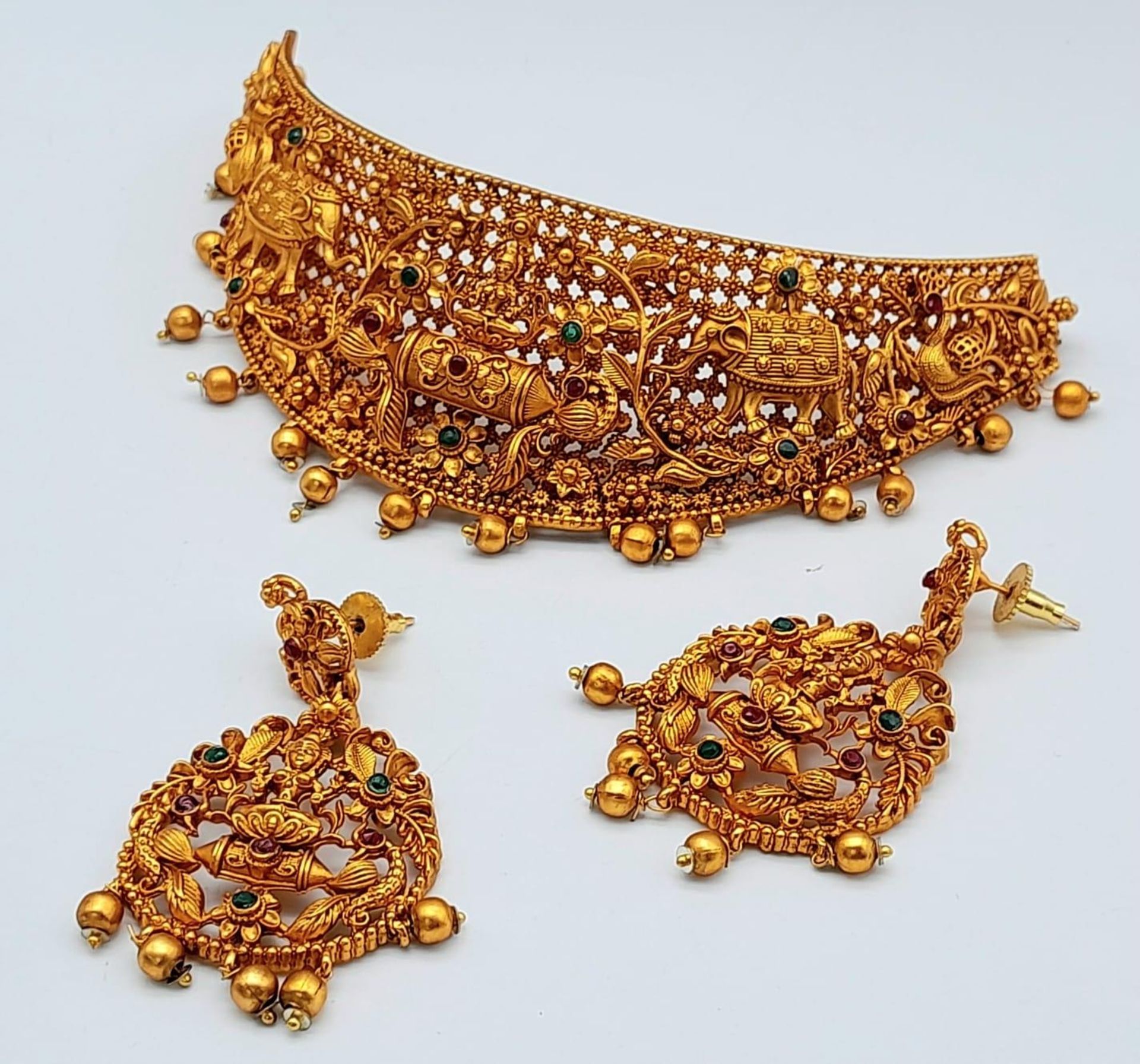 A South Indian traditional “Temple Jewellery” consisting of a necklace and matching earrings in an