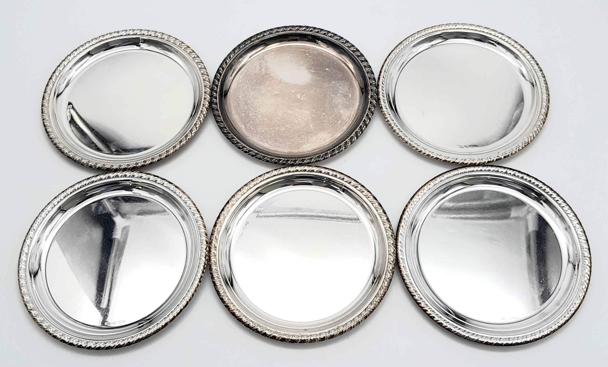A SET OF SIX SOLID SILVER COASTERS IN 800 SILVER , NICELY EDGED AND BEING 10cms in DIAMETER . 316gms - Image 2 of 5
