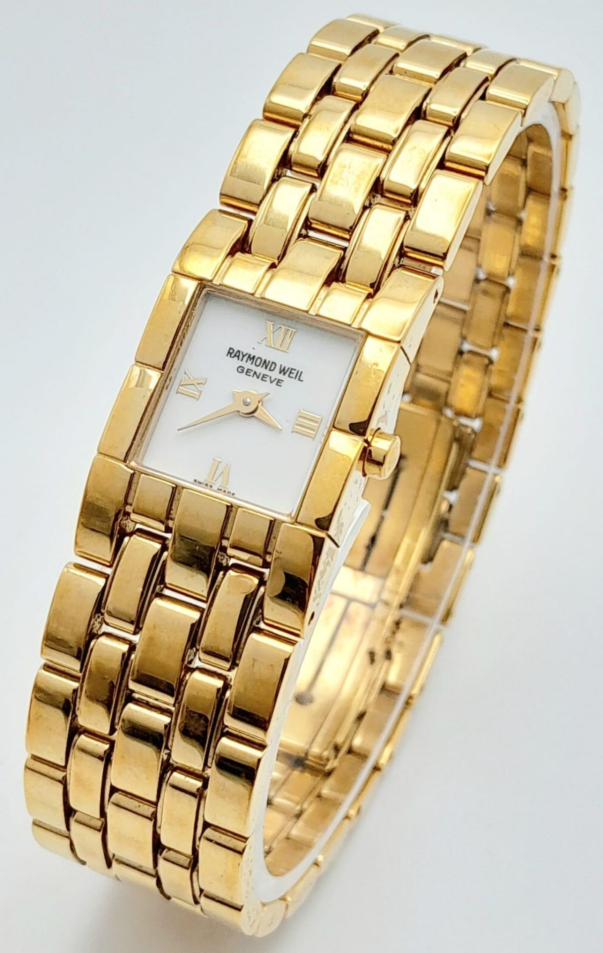 A Beautiful Gold Plated Raymond Weil Ladies Cocktail Watch. Gold plated bracelet and case - 17mm.