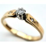 A 9K YELLOW GOLD DIAMOND SOLITAIRE RING. 0.10CT. 1.8G. SIZE N