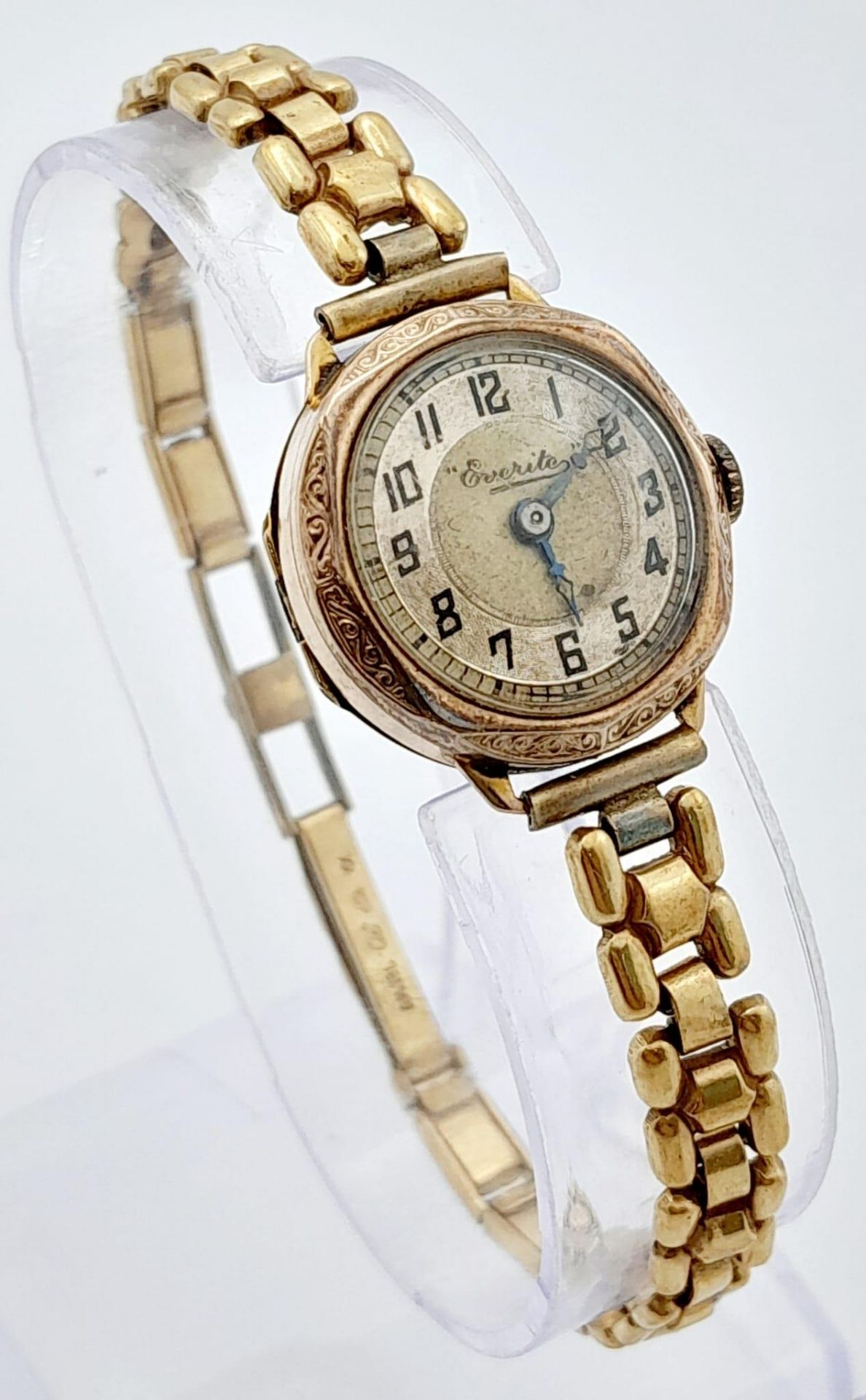 A Vintage 9K Gold Cased Everite Ladies Watch. Gold plated bracelet. 9K gold case - 21mm. Patinaed