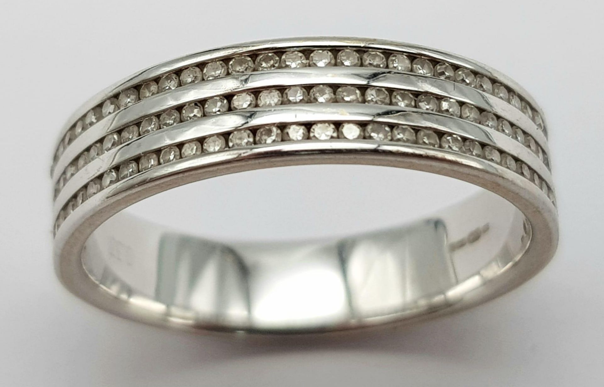 An 18K White Gold Triple Row Diamond Half Eternity Ring. 0.48ctw. Size P. 4.7g total weight. - Image 2 of 5