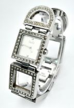 The very iconic ladies DOLCE & GABBANA watch with the D & G logo studded in Swarovski crystals.