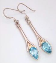 A Pair of Sterling Silver Blue Topaz Set Earrings. 5cm Length. Set with 1cm Length Tear Drop/Pear