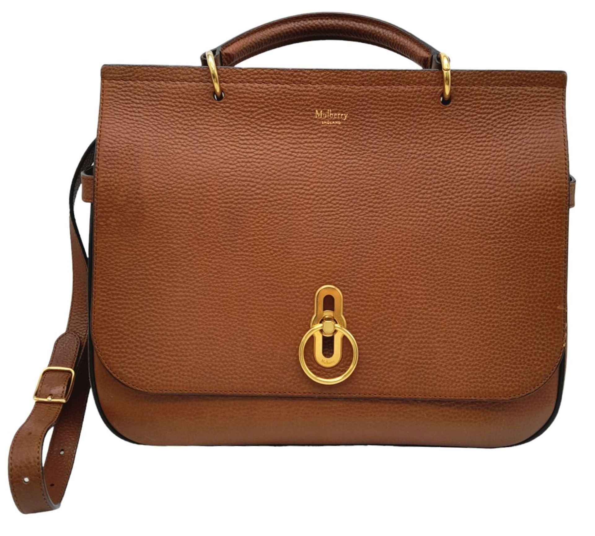 A Mulberry Amberley Satchel Handbag. Brown leather exterior with gold tone hardware. Flap-over front