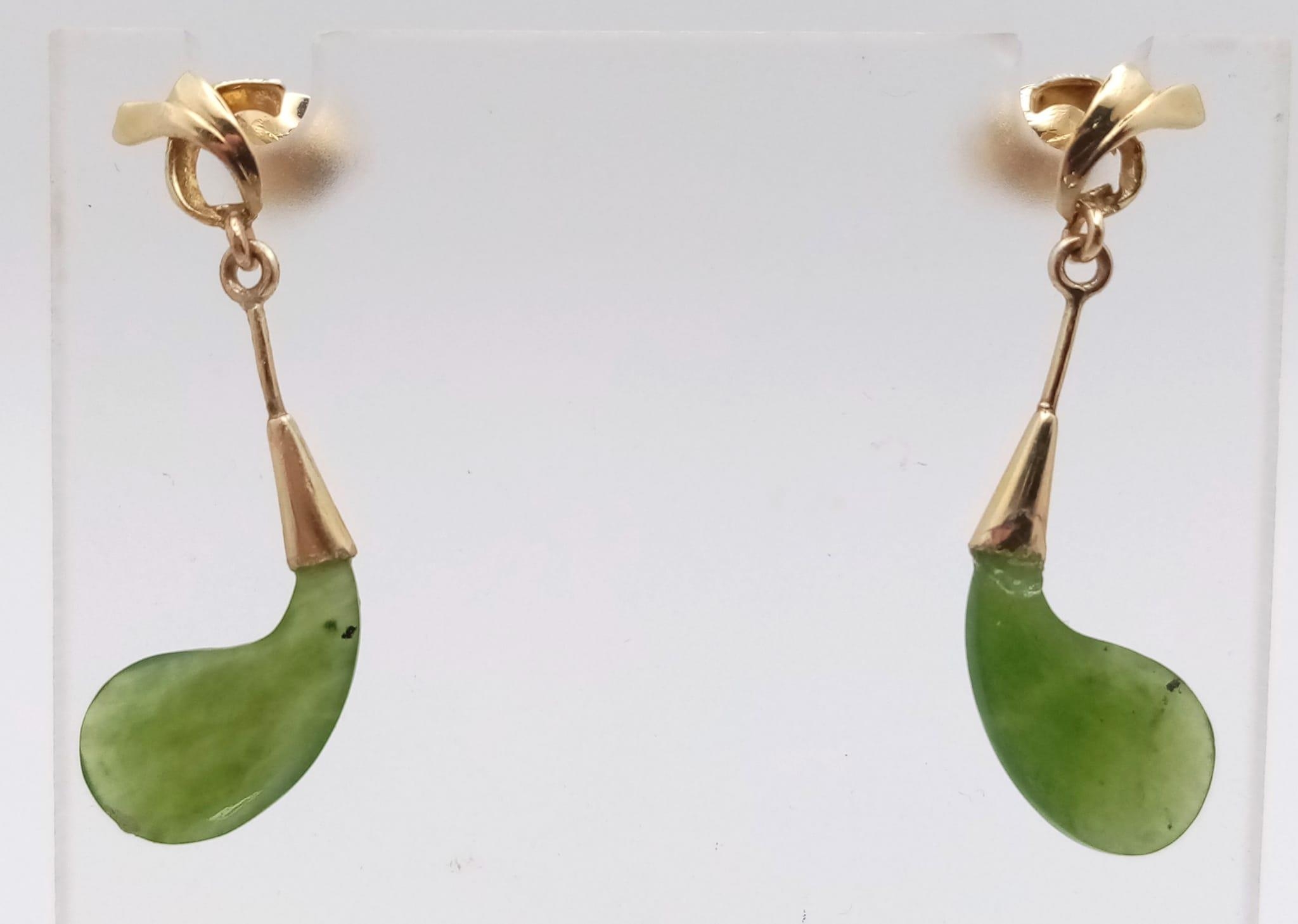 A Pair of 14K Yellow Gold and Jade Earrings. 2.4g total weight. - Image 2 of 5