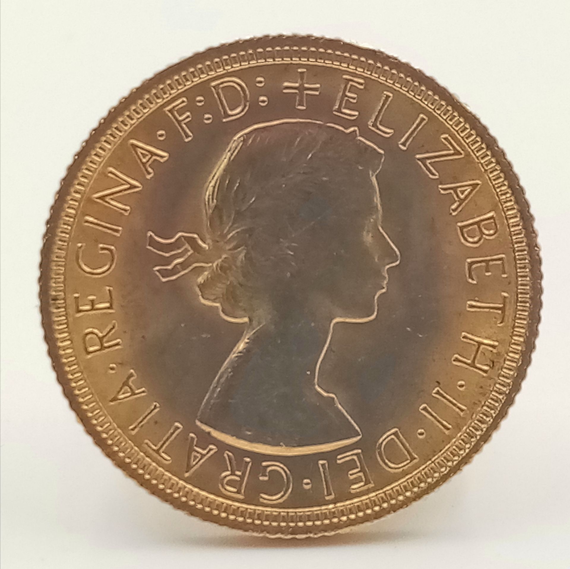 A 22 K yellow gold, Queen Elizabeth II, 1967, sovereign, full weight (8 g.), good condition, but - Bild 2 aus 3