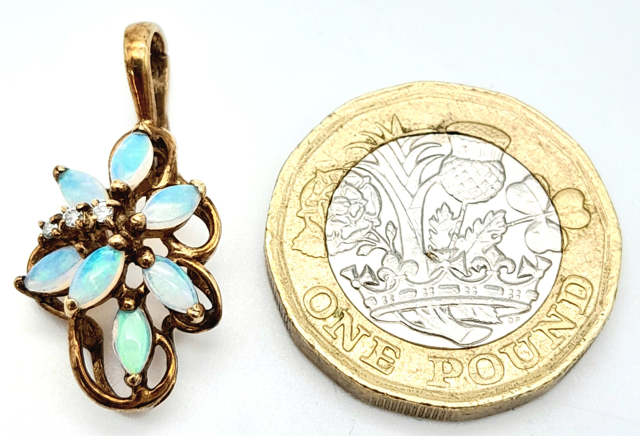 A 9K YELLOW GOLD DIAMOND & OPAL SET VINTAGE PENDANT. 2.7cm length, 1.9g total weight. Ref: SC 8040 - Image 4 of 4