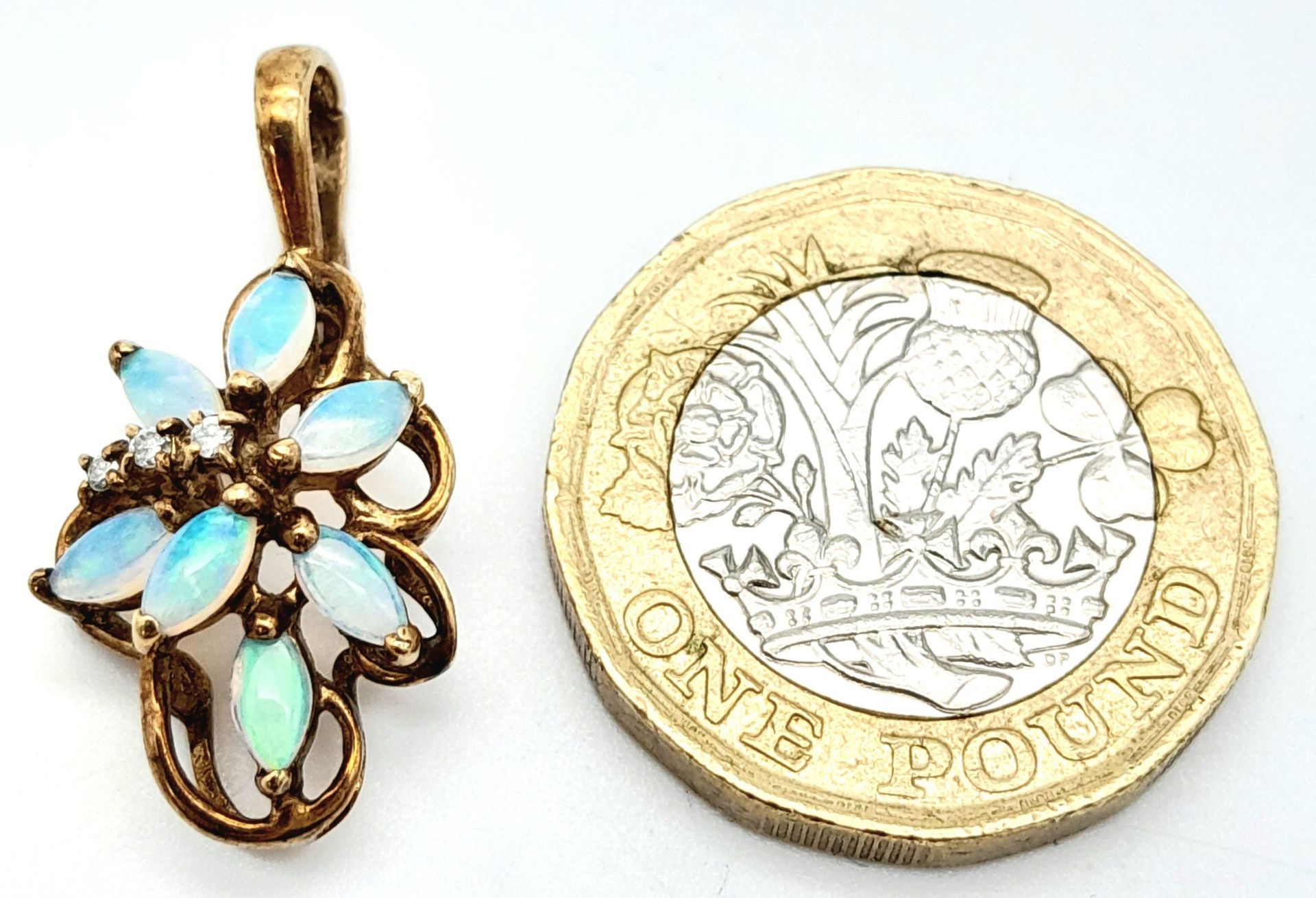 A 9K YELLOW GOLD DIAMOND & OPAL SET VINTAGE PENDANT. 2.7cm length, 1.9g total weight. Ref: SC 8040 - Image 4 of 4