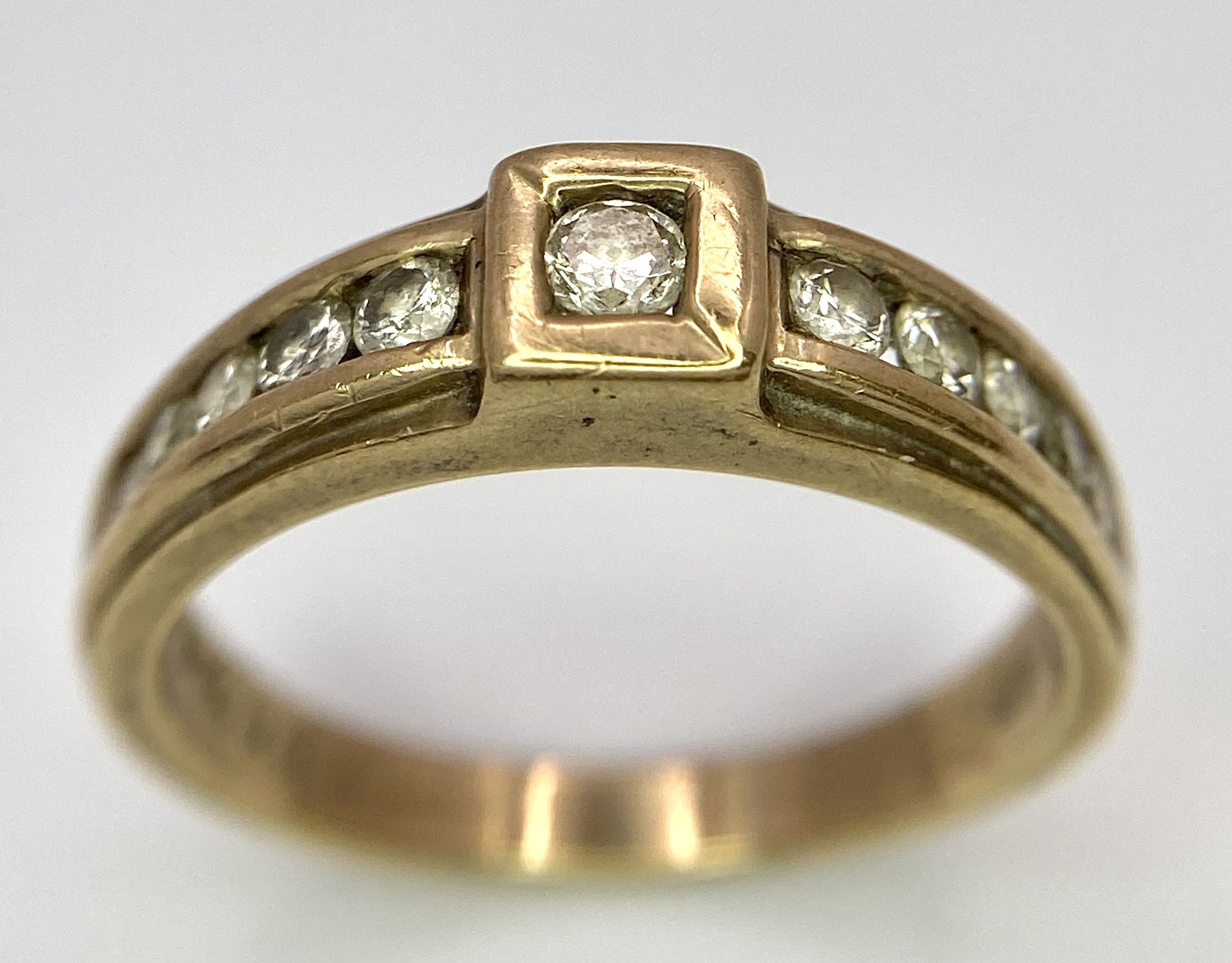 A Vintage 9K Yellow Gold Diamond Half-Eternity Ring. Belt buckle design. Size R. 3.7g total weight. - Image 3 of 6