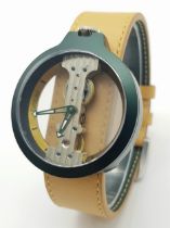 A Verticale Mechanical Top Winder Gents Watch. Brown leather strap. Ceramic green skeleton case -