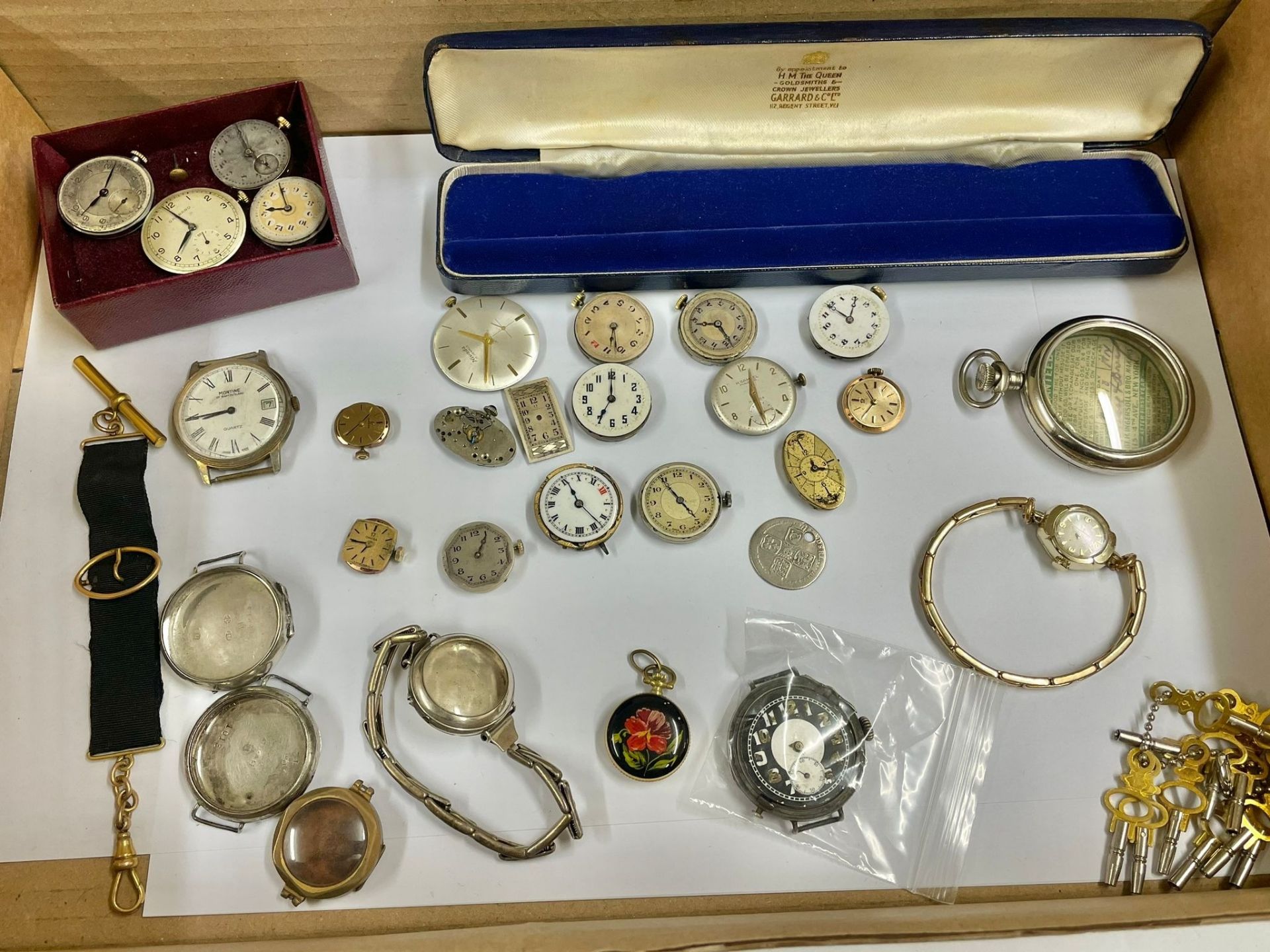 Assorted watch movements etc to include omega & Garrard