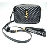 A YSL Saint Laurent Black Lou Matelasse Camera Bag. Leather exterior, gold-tone hardware, adjustable