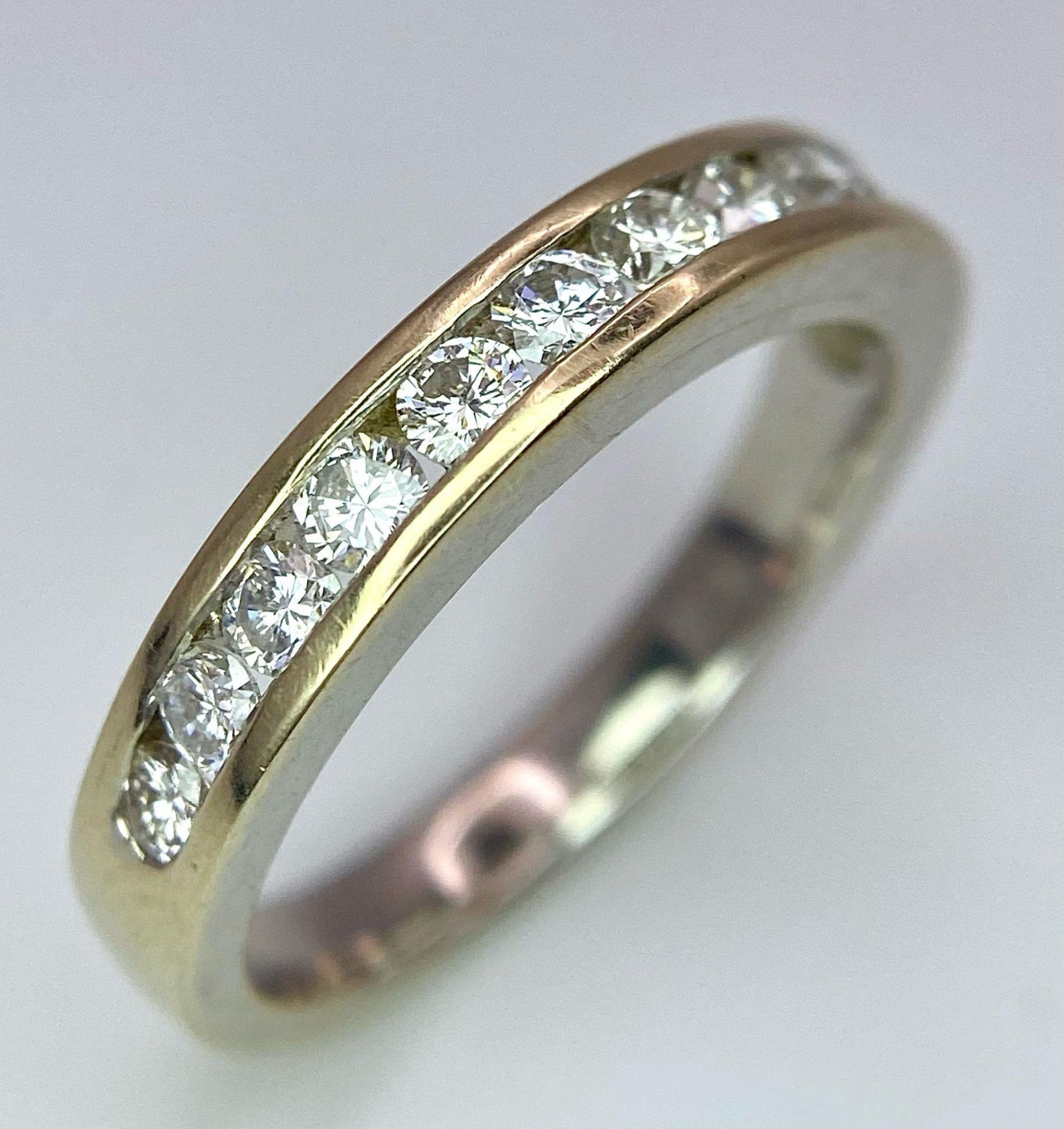 An 18K Yellow Gold Diamond Half Eternity Ring. 12 brilliant round cut diamonds - 0.60ctw. Size N. - Bild 2 aus 6