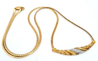 A 9K Yellow Gold Choker Necklace with Small Diamond Decoration. 40cm. 6.2g total weight.