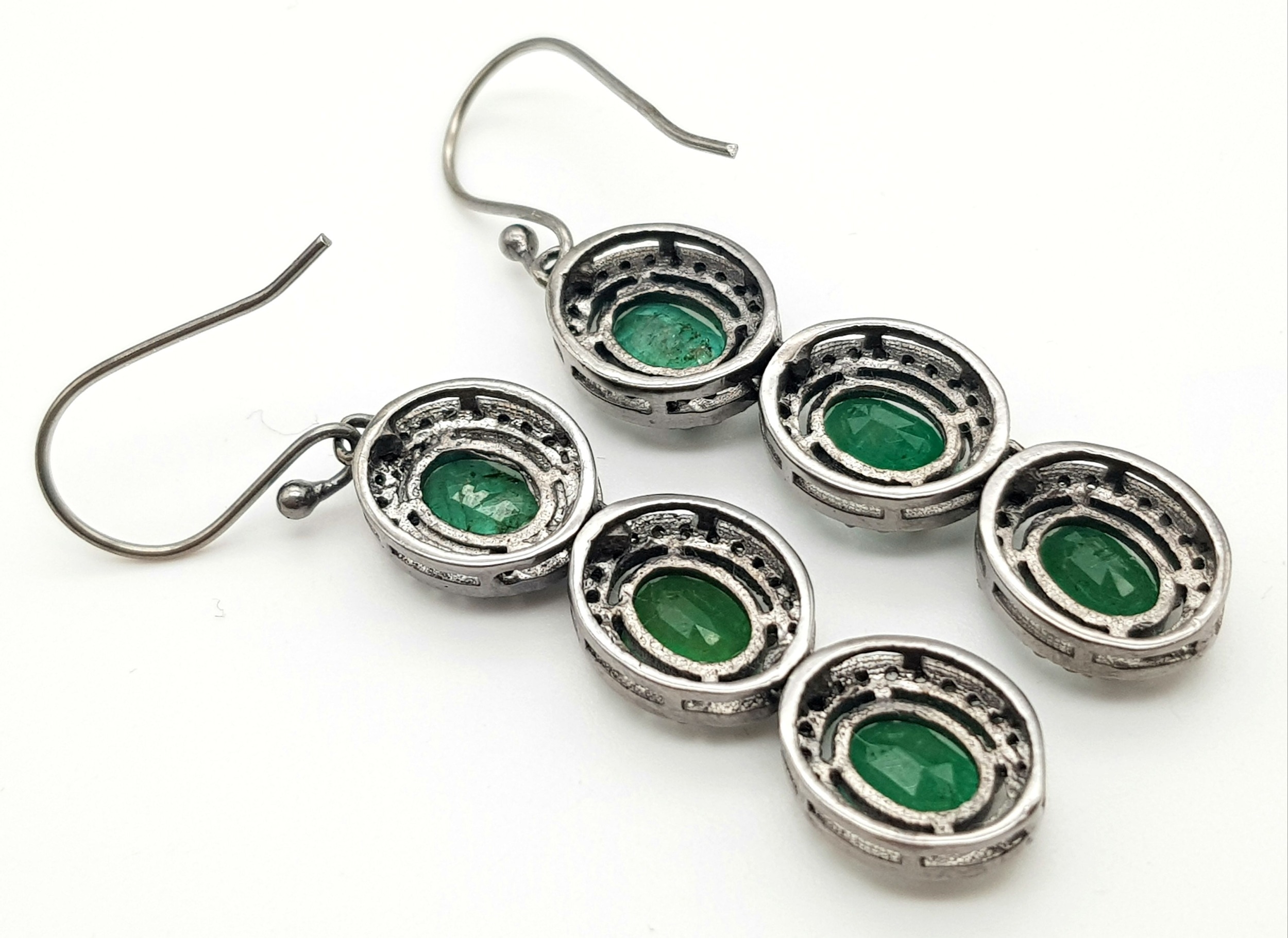 A Pair of Emerald Gemstone Drop Earrings with Halos of Diamonds. Set in 925 Silver. Emeralds - - Image 3 of 4