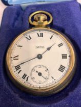 Rare Vintage SMITHS POCKET WATCH.Finished in gold tone with white face and black Roman numerals with