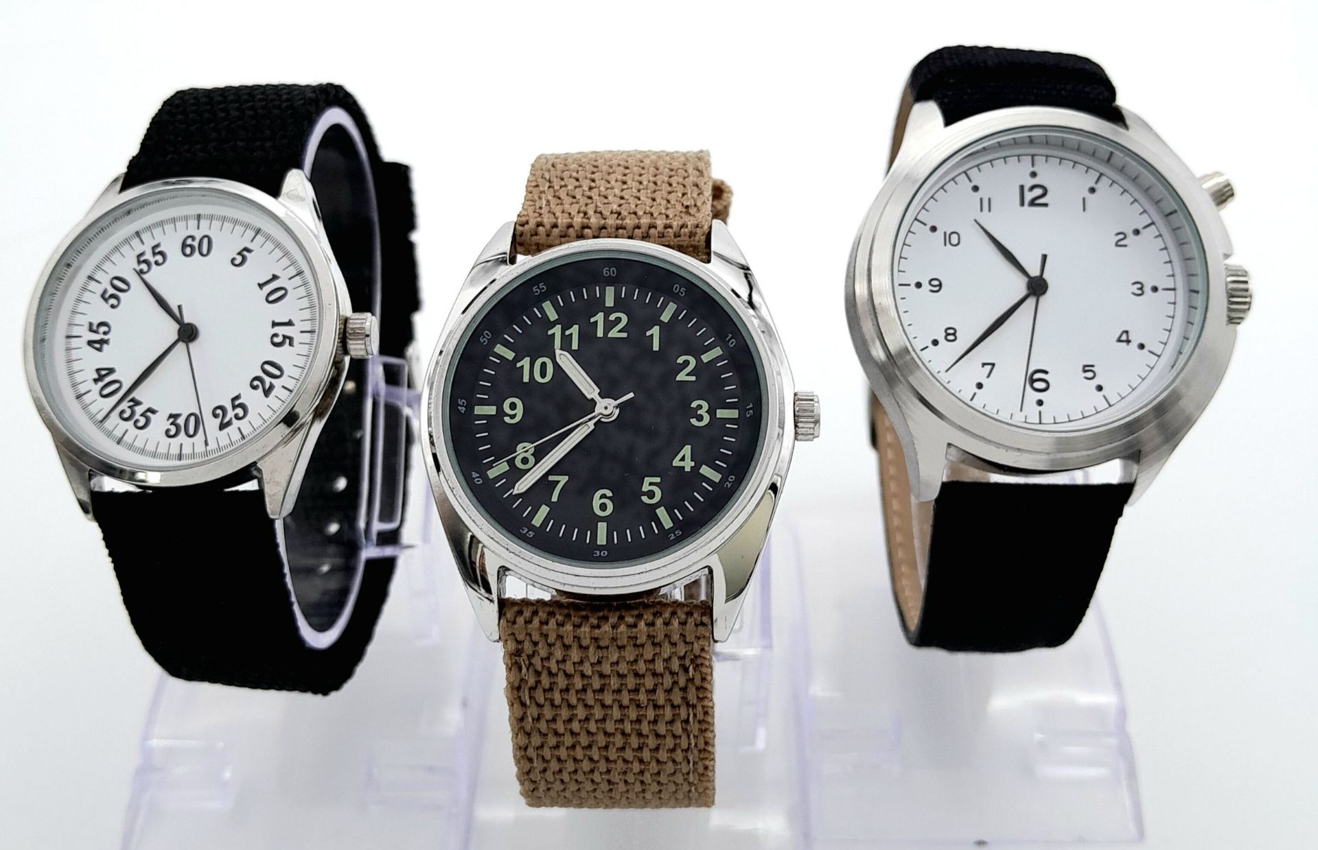 Three British Military Designed Watches. Comprising: 1) A 1960’s Design British Submariners Watch (