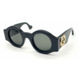 A Pair of Gucci Black Round Sunglasses. Gold-toned GG logos to sides. Thick frames. Comes with
