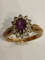 Vintage 9 carat GOLD and AMETHYST RING.Having Oval Cut AMETHYST mounted to centre with clear