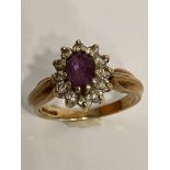 Vintage 9 carat GOLD and AMETHYST RING.Having Oval Cut AMETHYST mounted to centre with clear