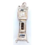 A Sterling Silver Grandfather Clock Charm, which Opens to Reveal the Movement. 3.2cm length, 4.5g