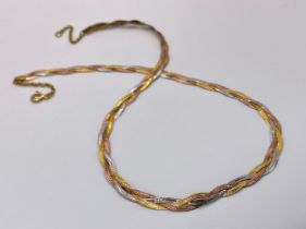 A 9K Tri-Colour Gold Entwined Flat Necklace. 44cm. 7.6g weight