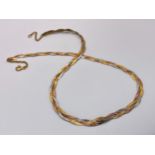 A 9K Tri-Colour Gold Entwined Flat Necklace. 44cm. 7.6g weight