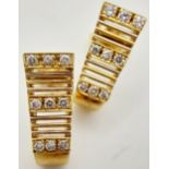 A PAIR OF 14K YELLOW GOLD DIAMOND SET EARRINGS. 0.20ctw, 1.7cm length, 4.7g total weight. Ref: SC