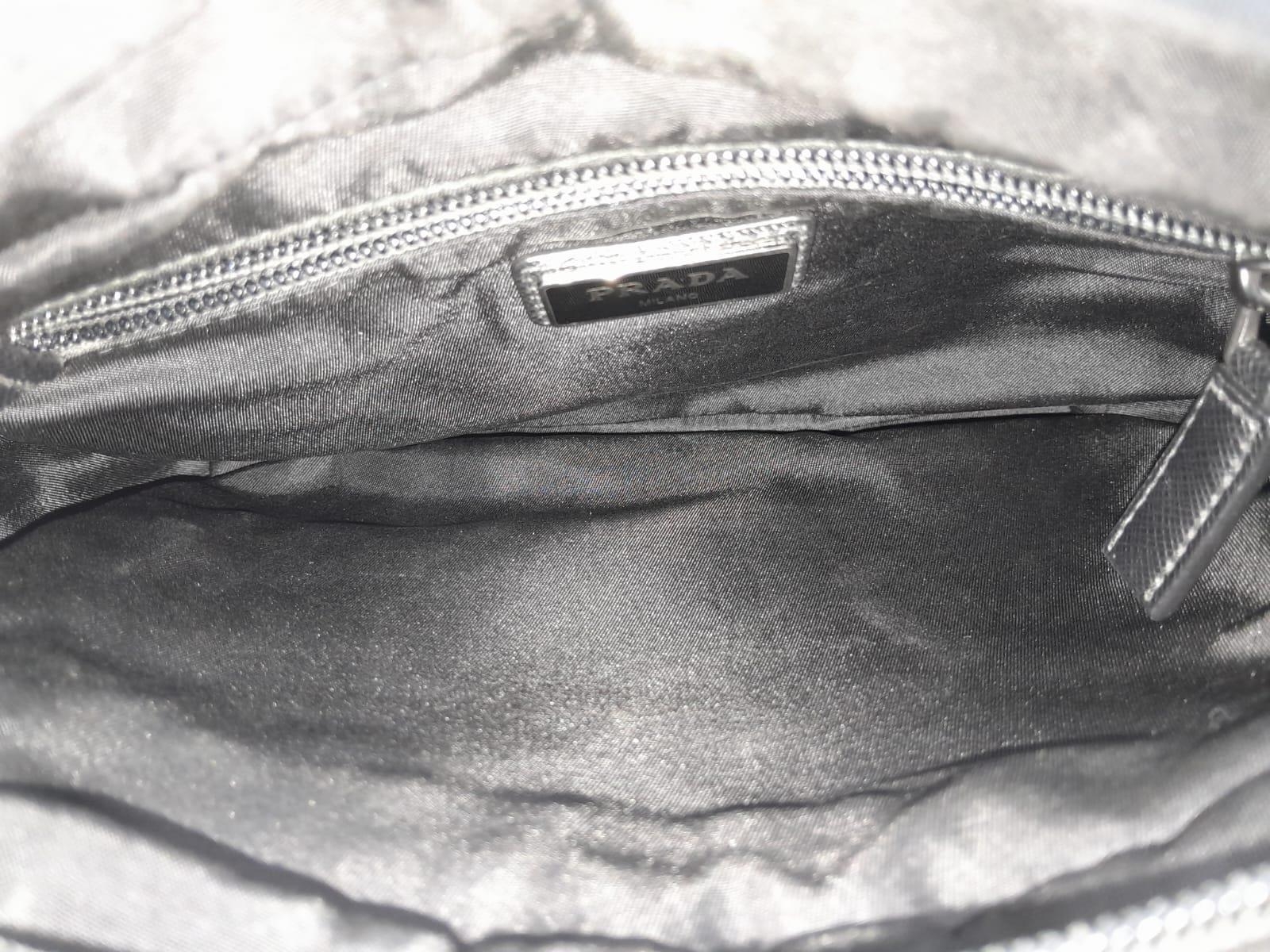 A Prada Black 'Tessuto Montagna' Crossbody Bag. Textile exterior with silver-toned hardware, a - Image 8 of 11
