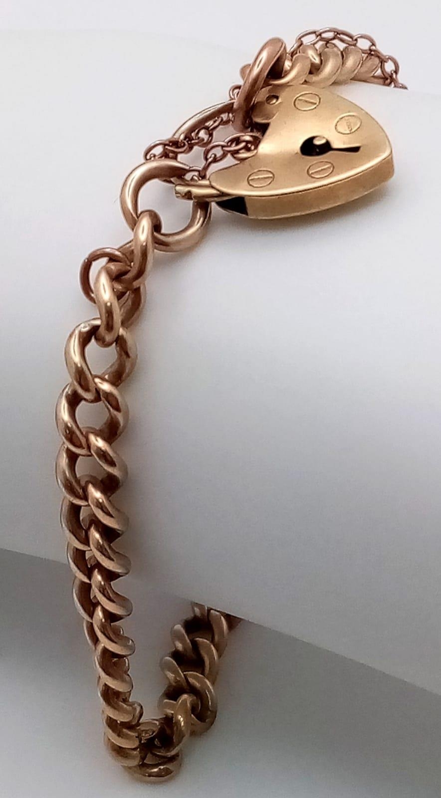 A Vintage 9K Yellow Gold Curb Link Bracelet with Heart Clasp. 20cm. 15.7g weight. - Image 2 of 3