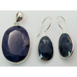 A Blue Sapphire Pendant with Matching Earrings - Both set in 925 Silver. 4cm and 3.5cm.