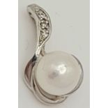 A 9ct White Gold Diamond and Pearl Pendant, 6mm pearl size, 0.02ct diamond, 0.9g weight, approx 15mm
