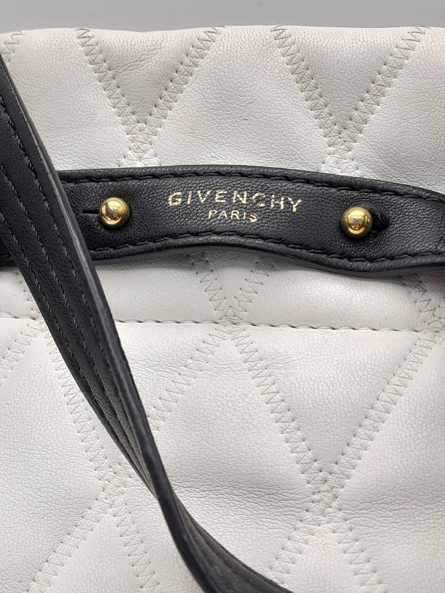 A Givenchy Black and White Duo Backpack. Quilted leather exterior with gold-toned hardware, a zipped - Image 6 of 10