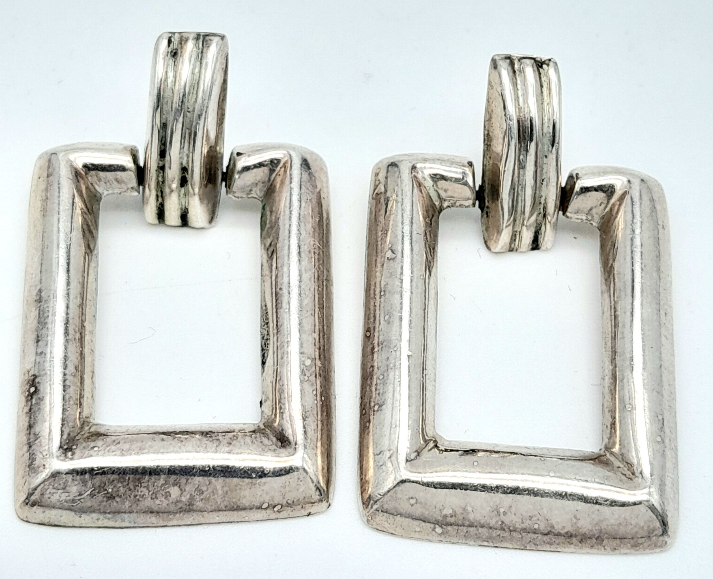 A stylish pair of 925 silver large rectangular drop earrings. Total weight 11.4G. 3X5 cm