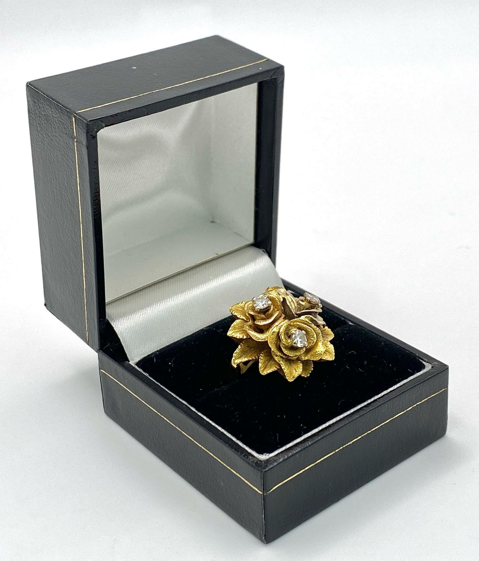 An 18K Yellow Gold and Diamond Floral Design Ring. A rich cluster of golden petals give sanctuary to - Image 10 of 10