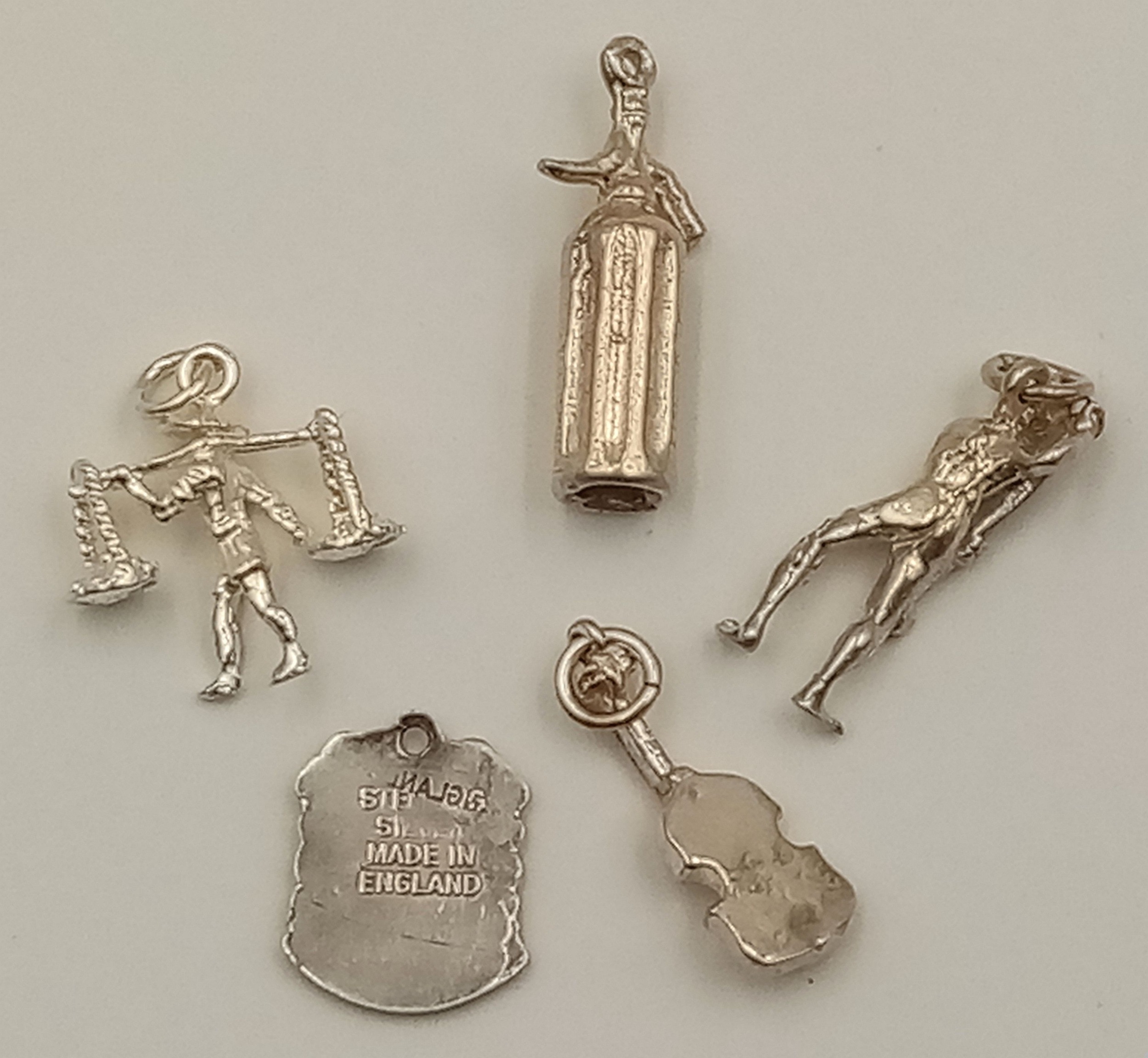 A Selection of 5x sterling silver charms of different designs 10.6g total weight. ref: TB08 - Image 2 of 2