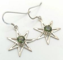A Pair of Sterling Silver Pleidean Moldavite Set Star Earrings. 2.4cm Wide.