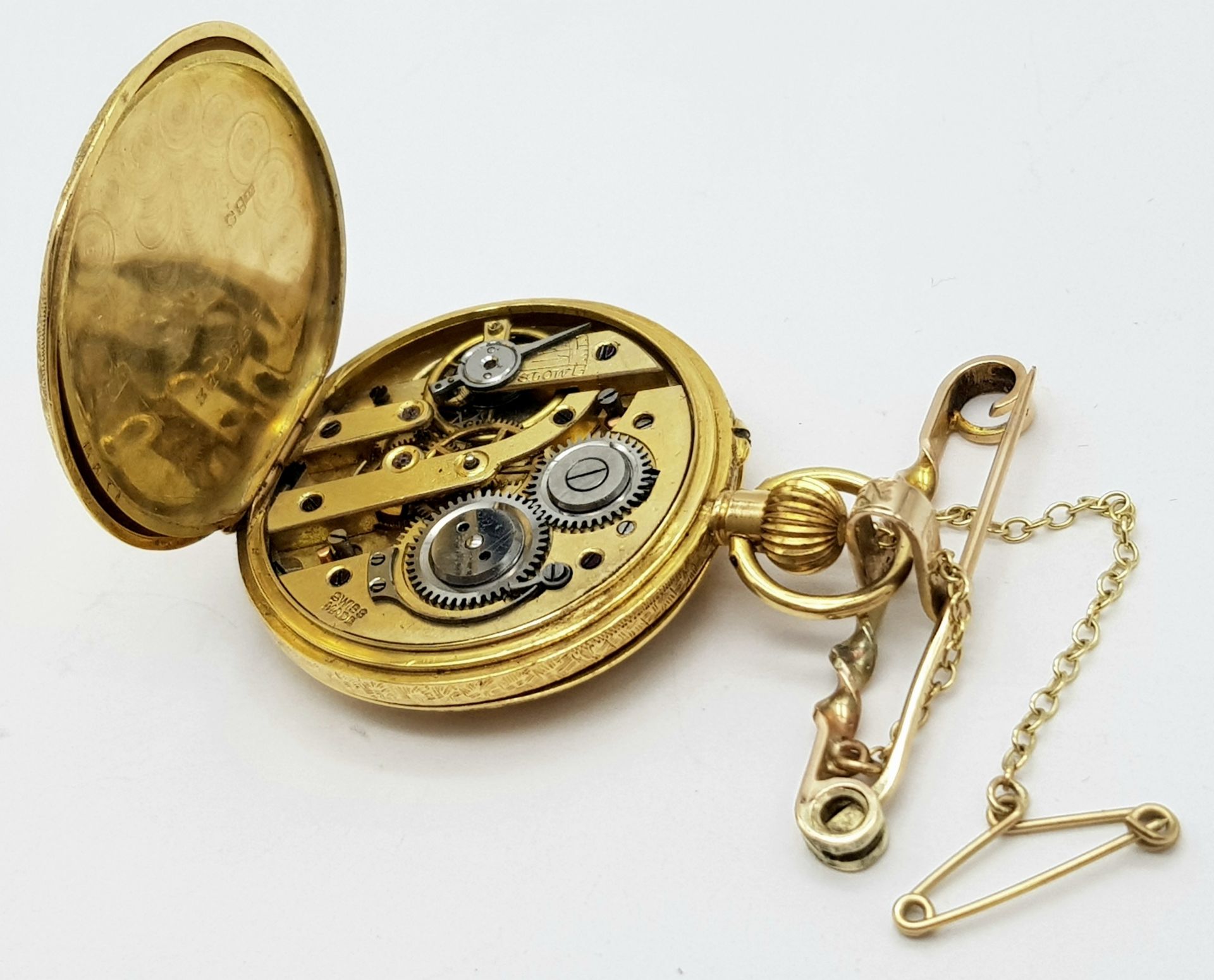 A Vintage 18K Gold Miniature Pocket Watch. A beautifully engraved half-hunter design. Top winder. - Image 6 of 11