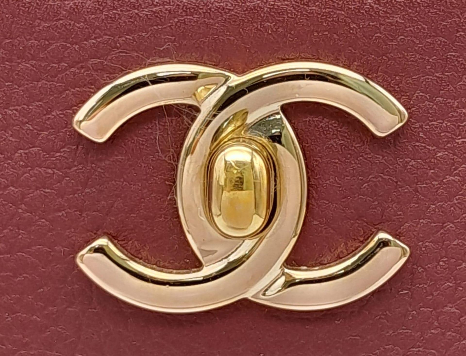 A Chanel Neo Executive Leather Tote Bag. Burgundy leather exterior with gold tone hardware and two - Image 11 of 11