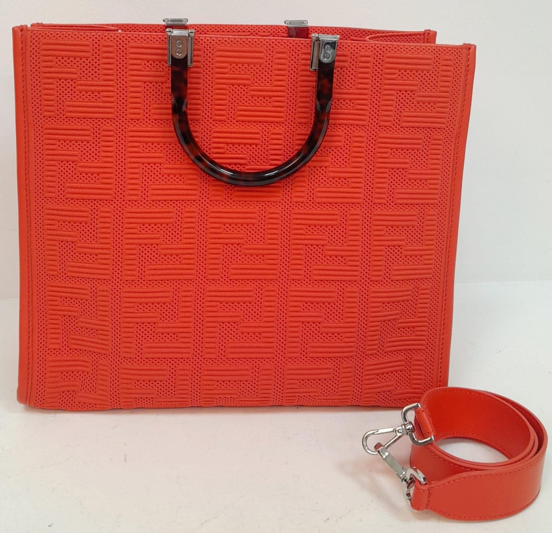 A Fendi Coral Sunshine Tote Bag. Textile exterior with leather trim, silver-toned hardware and two - Image 6 of 7