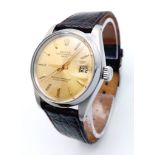 A Rolex Model 1500 Oyster Perpetual Date Automatic Gents Watch. Brown leather strap. stainless steel