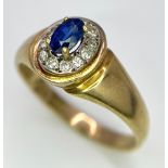 A 9K YELLOW GOLD, DIAMOND AND SAPPHIRE RING. 2.7G. SIZE N.