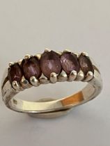 Impressive SILVER and AMETHYST RING consisting 5 x Amethyst gemstones Oval cut and mounted to top.