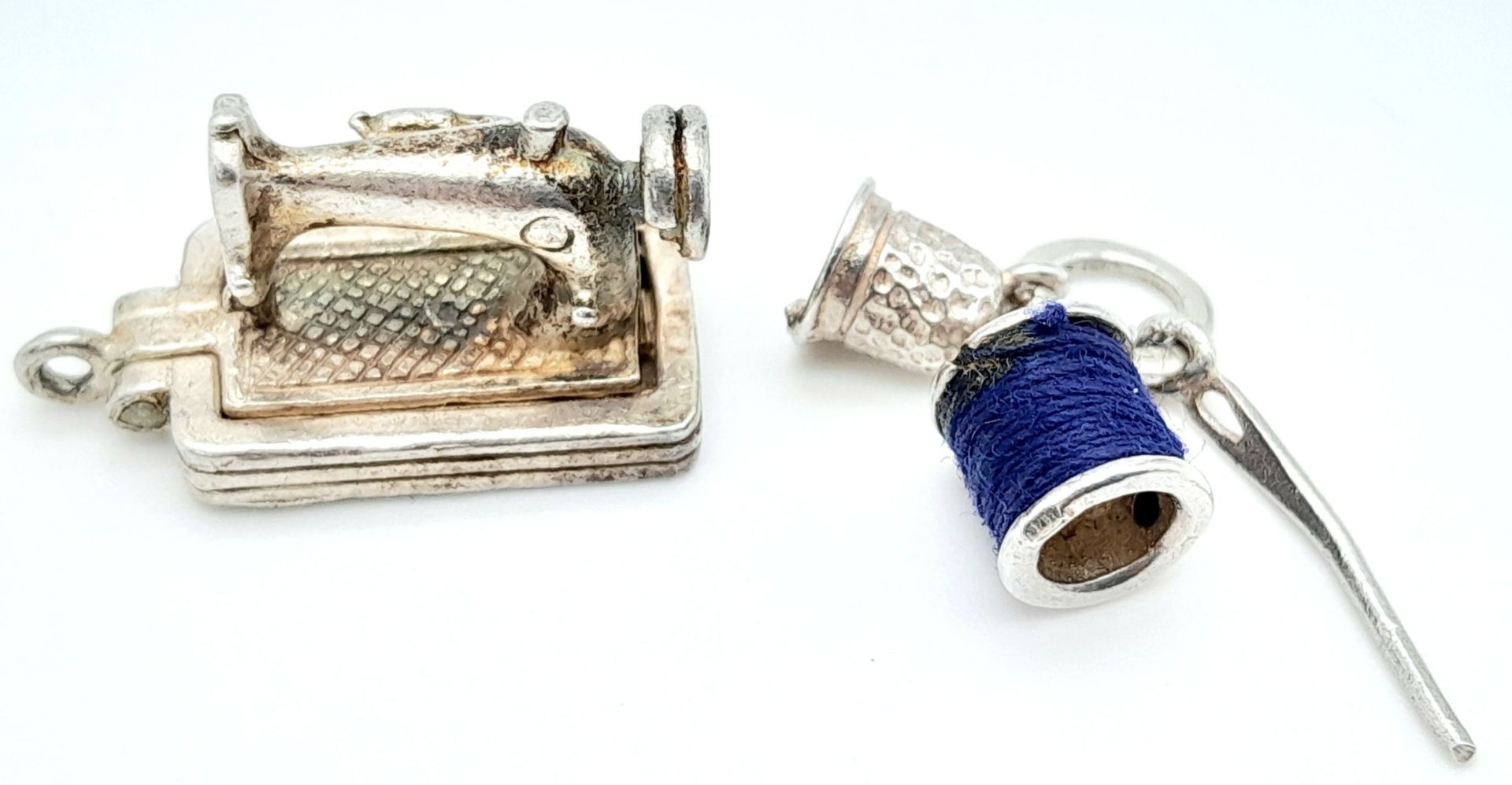 2 X STERLING SILVER SOWING THEMED CHARMS - sewing machine, and thimble, thread & needle. 1.9cm and