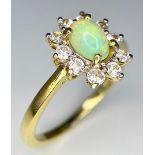 A 925 Gilded Opal Ring. Size N.