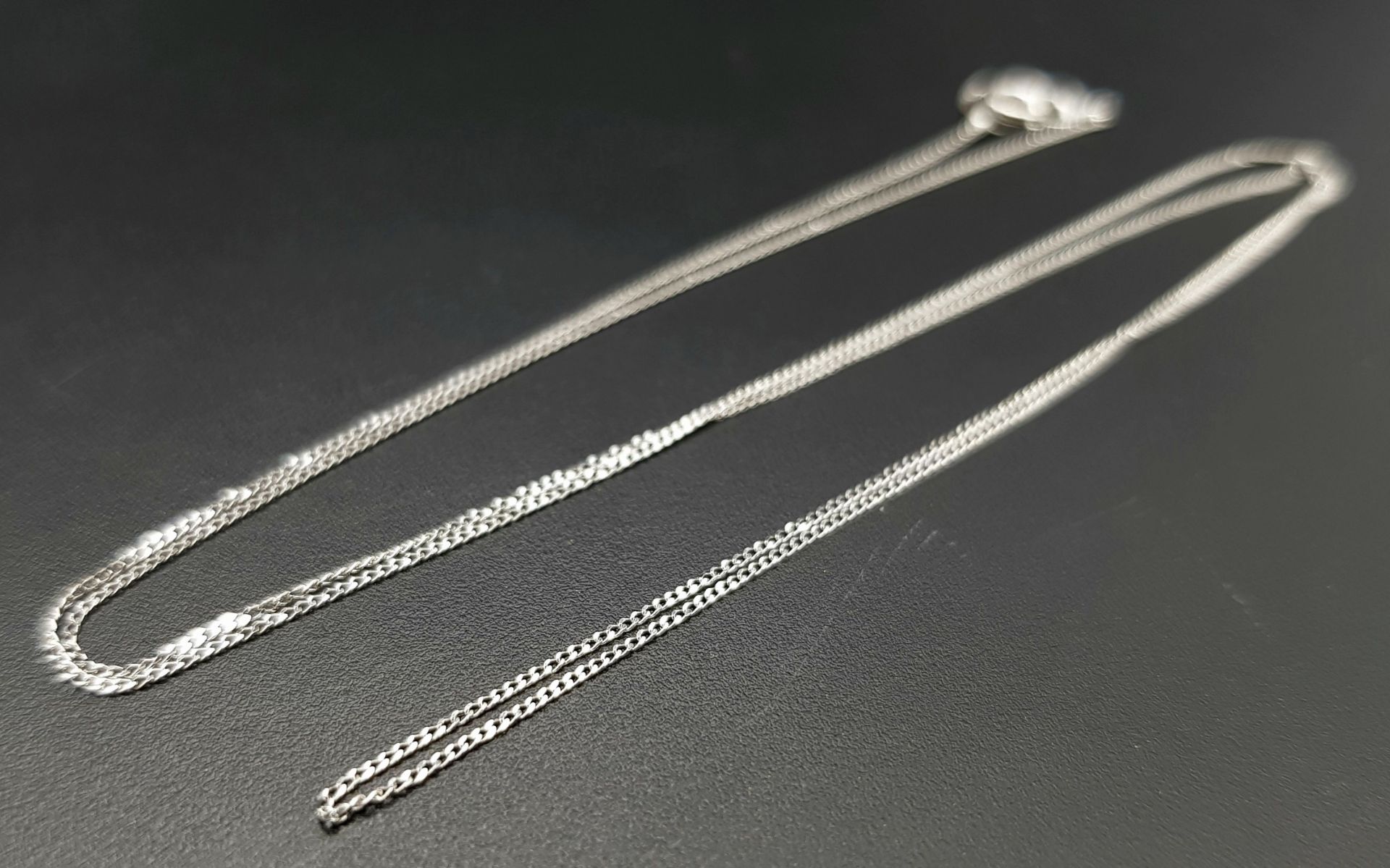 A 9 K white gold disappearing chain necklace, length: 46 cm, weight: 0.5 g. - Image 2 of 4